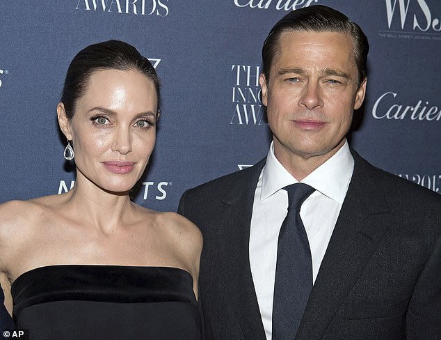 A different insider speculated that Jolie's snub was related to her bitter divorce from fellow Oscar-winner Brad Pitt, which was finalized last month after an eight-year battle; the exes seen in November 2015